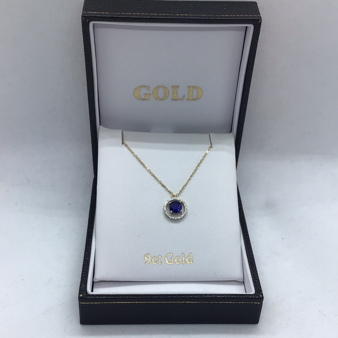 9ct Gold Blue Stone Pendant.