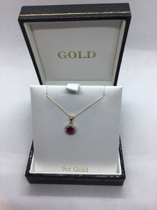 9ct. Gold CZ and Ruby CZ Pendant.